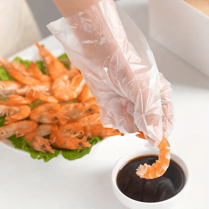 Disposable Plastic Gloves - 100 Pcs