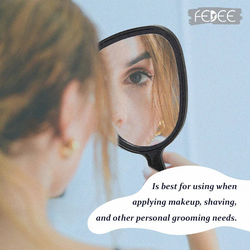 مرآة مكياج بيضاوية الشكل محمولة باليد